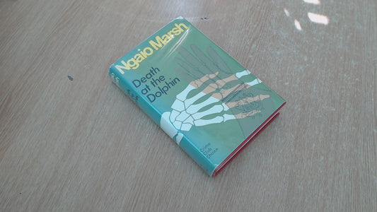 DEATH AT THE DOLPHIN.